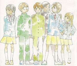 A group of six junior high school students standing side-by-side in school uniforms. From the left is a girl, two boys, a girl wearing a male uniform, and two other girls