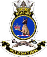 A ship's badge. A naval crown sits on top of a black scroll with "MELBOURNE" written in gold. This is atop a yellow, rope-patterned ring, in which the head and torso of a kangaroo, holding a crown, is depicted. Below the ring are a stone axe and a nulla nulla sitting on top of a boomerang. At the bottom of the badge is a black scroll with "VIRES ACQUIRIT EUNDO" written.