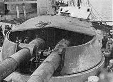 Two-gun turret with front section of armoured roof missing