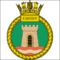 Crest rimmed with golden rope bearing the word Cardiff at the top. On top of the crest is a crown decorated with jewels and golden sails. In the crest is a castle tower on ocean waves, the tower has a golden portcullis.