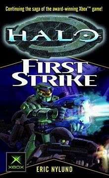 Cover shows two robot-like figures in bulky armor, one shining a spotlight and the other shooting a futuristic weapon