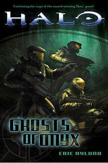 Cover shows three armor-clad figures carrying futuristic guns
