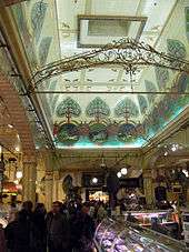 Large, ornate, high-ceilinged delicatessen