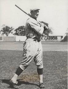 Harry Rosenberg with a baseball bat in a baseball uniform