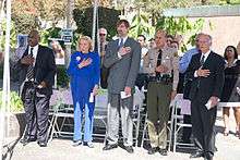 Henry Nicholas and his mother, Marcella Leach, join John Gillis, former National Director, U.S. Department of Justice Office for Victims of Crime, Los Angeles County Sheriff Lee Baca and then-California Attorney General Jerry Brown at the annual National Day of Remembrance event in downtown Los Angeles