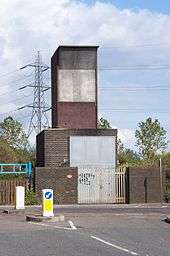 The aboveground Ferry Lane fan shaft building and emergency access point at Heron Island, approximately halfway between Blackhorse Road and Tottenham Hale tube stations