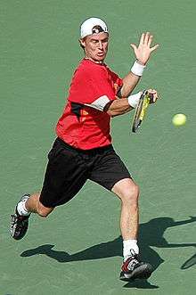 Lleyton Hewitt hitting a tennis ball