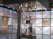 Trophy bowl and base in glass case