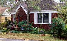 A small, one-story brick-faced house with a small yard in front. This house is located in Little Rock, Arkansas. Hillary Rodham and Bill Clinton lived in this house when Bill was Arkansas Attorney General from 1977 to 1979.