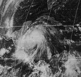 Low-resolution satellite image of a tropical cyclone to the east of Central America