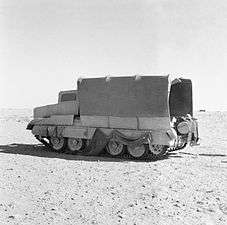 Crusader tank with a 'Sunshield' mimicking a truck in Operation Bertram