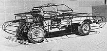 Imperial War Museum photograph of a jeep fitted with the frame of a dummy tank in the desert near Cairo, 1942