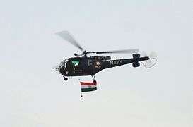 Helicopter flying the Indian flag