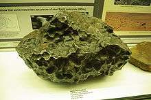 Pock-marked lump of iron ore