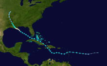 The path of a tropical cyclone on a map in six-hour intervals. Colored dots represent differentiating intensities. The track begins at the bottom right, moves generally to the left and then towards the upper-left corner. In its path it crosses multiple islands.
