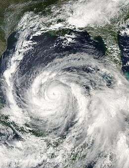 Satellite imagery of a mature hurricane entering the Gulf of Mexico.