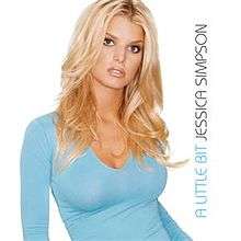 A blond woman looks to the front. She wears an indigo colored top, and is standing in front of a white background. To the right of the picture, the words "A Little Bit" and "Jessica Simpson" are written upside down vertical.