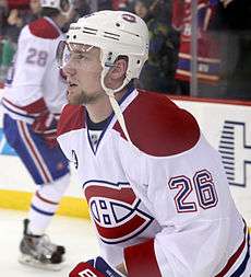 Jiri Sekac in a red and white away Canadiens jersey with his jersey number, 26 on his sleeve.