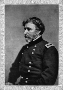 A head and torso photograph of a United States general during the American Civil War.  He is looking to the right, almost in profile.  He has fairly short, dark hair and a short beard that is mostly grey.