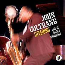 A blurred photo of Coltrane playing saxophone onstage