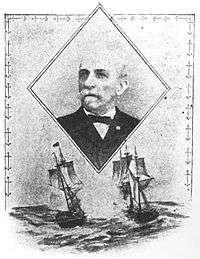 Head of a white man with a mustache wearing a suit and bow tie. Below the portrait is an illustration of two sailing ships at sea.