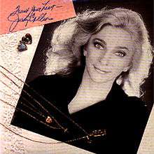 Cover art for Trust Your Heart - a photo of Judy Collins and some jewelry on a dresser top