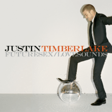 A picture of a young man who wears a suit while crushing a disco ball. The background is gray and in the middle are the words 'Justin' (written in black) and 'Timberlake' (written in orange), while under them is 'FutureSex/LoveSounds' in niances of gray.