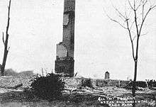 a single chimney is all that is left standing after Kehoe's bombs destroyed his farm