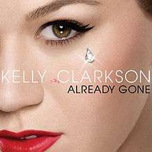 The left side of the face of a woman of white complexion. She is wearing mascara and a red lipstick. Near her eye a shiny drop is seen. In front of her image the words "Kelly Clarkson" are written in white capital letters, while the words "Already Gone" are written in black capital letters.