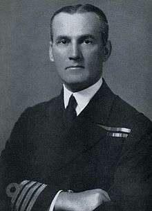 Official service photograph of Captain Kenneth Dewar in a formal pose.