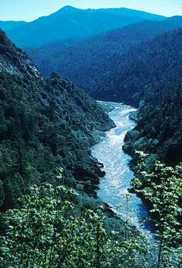 A river with whitewater in a canyon