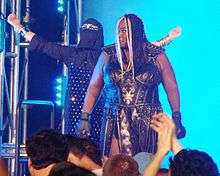 Awesome Kong with Raisha Saeed during her entrance at Bound for Glory IV