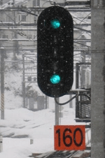 Two vertical green lights, with three blank lights between