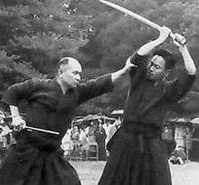 Kuroda Ichitaro and Kaminoda Tsunemori of Shintō Musō-ryū performing Ikkaku-ryū juttejutsu