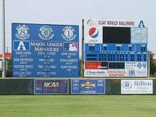 A The scoreboard, brag board and championship years in left center field