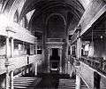 Peterskirche, black-and-white view of the interior toward the altar, showing a vaulted roof and two tiers both right and left
