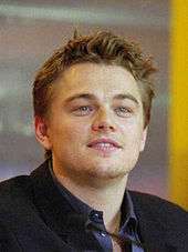 A photograph of Leonardo DiCaprio attending a press conference for The Beach.