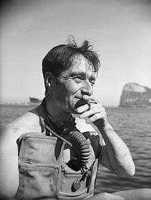 IWM photo of Lt. Lionel 'Buster' Crabb, RNVR, Officer in Charge of the Underwater Working Party at Gibraltar, dated April 1944