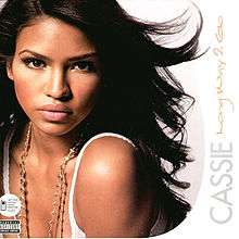 A close-up of Cassie's face. To the right is her name and album title rotated 90 degrees counterclockwise.
