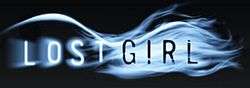 Black background with slender sans-serif words "LOST GIRL" amid curving wisps of bluish-white fog resembling long hair, and the more solid curve of a female form laying on its side.