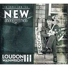 On the left half of a black-and-white album cover, the text "10 Songs for the New Depression" along the top and "Loudon Wainwright III" along the bottom. On the right half, an image of a man with crossed legs sitting on a bench, holding a guitar and an American flag. Behind the man is a "Welcome" sign, a mounted fire extinguisher and a window with the "No Public Restrooms" sign.