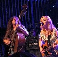 Lydia Loveless (right) with husband/bassist Ben Lamb (left) playing in Fort Collins, Colorado (2011)