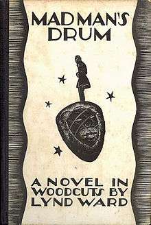 A book cover with a black-and-white illustration of a man standing atop an African drum with the image of a face on it.  The title at the top reads "Madman's Drum", and at the bottom reads "A novel in woodcuts by Lynd Ward".