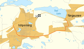 A map of Marquette County in the Upper Peninsula of Michigan and the surrounding area. There is a line on the map showing the route of M-28 running west to east, and a red line running to the south of it showing the route of Business M-28.