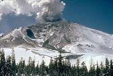 Erupting conical volcano