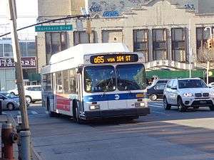A bus in Q65 service in Queens