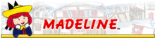 An image of Madeline (a young girl with red hair in a yellow hat) is to the right of the image. The word "Madeline" is written in red, capital letters over an image of a city (in the graphics of the game series)