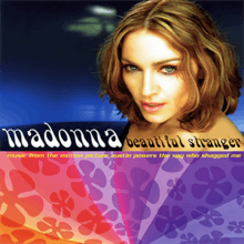 Madonna looking towards the camera in front of a blue background. The lower half of the cover art shows the artist and song name in front of a violet flowery background.