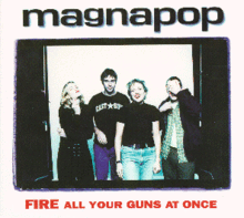A photograph of the band is inserted in the middle of the album cover. From left to right: guitarist Ruthie Morris poses with her hand to her chin, bassist Shannon Mulvaney stands to her left, vocalist Linda Hopper stands to his left smiling, and drummer David McNair is at the extreme left covering his face with his left hand. A white border surrounds the photo with "magnapop" written in black at the top and "FIRE ALL YOUR GUNS AT ONCE" written in red at the bottom; "FIRE" is larger than the rest of the title.