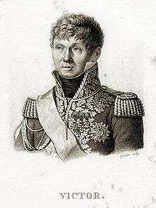 Black and white print of a curly-haired man with a round face. He wears an elaborate dark military uniform with a high collar, epaulettes, and lots of braid.